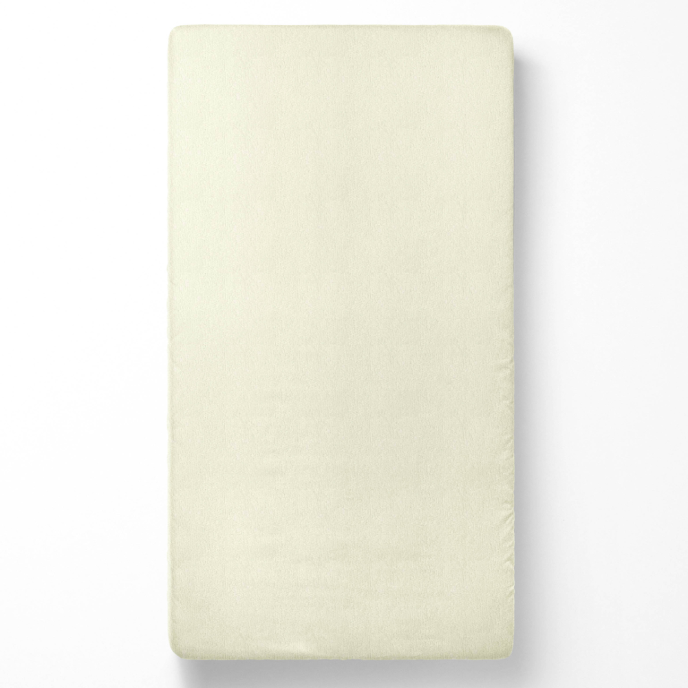 Kummiga voodilina „Cream Terry sheet“. Kummiga voodilina 160x200, 90x200 cm, 160x200 cm, 180x200 cm. Kreemikas frotee madratsikate, pakkudes siledat ja imavat pinda rahulikuks ööuneks.
