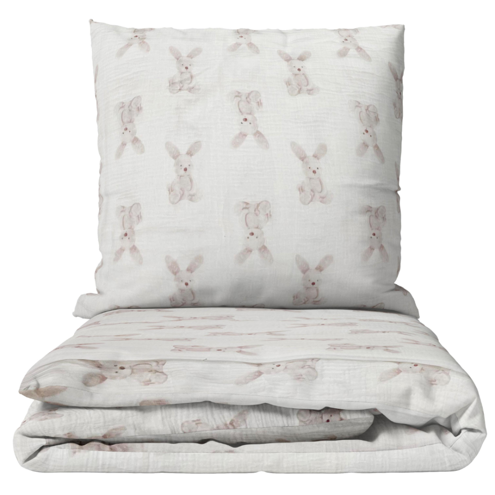 Musliinist voodipesu komplekt "Sweet Bunny Rest". Puuvillane voodipesu, 140x200 cm, 160x200 cm. Valge voodipesukomplekt, millel on peene liivakarva jänesemuster, minimalistlik ja mänguline disain.